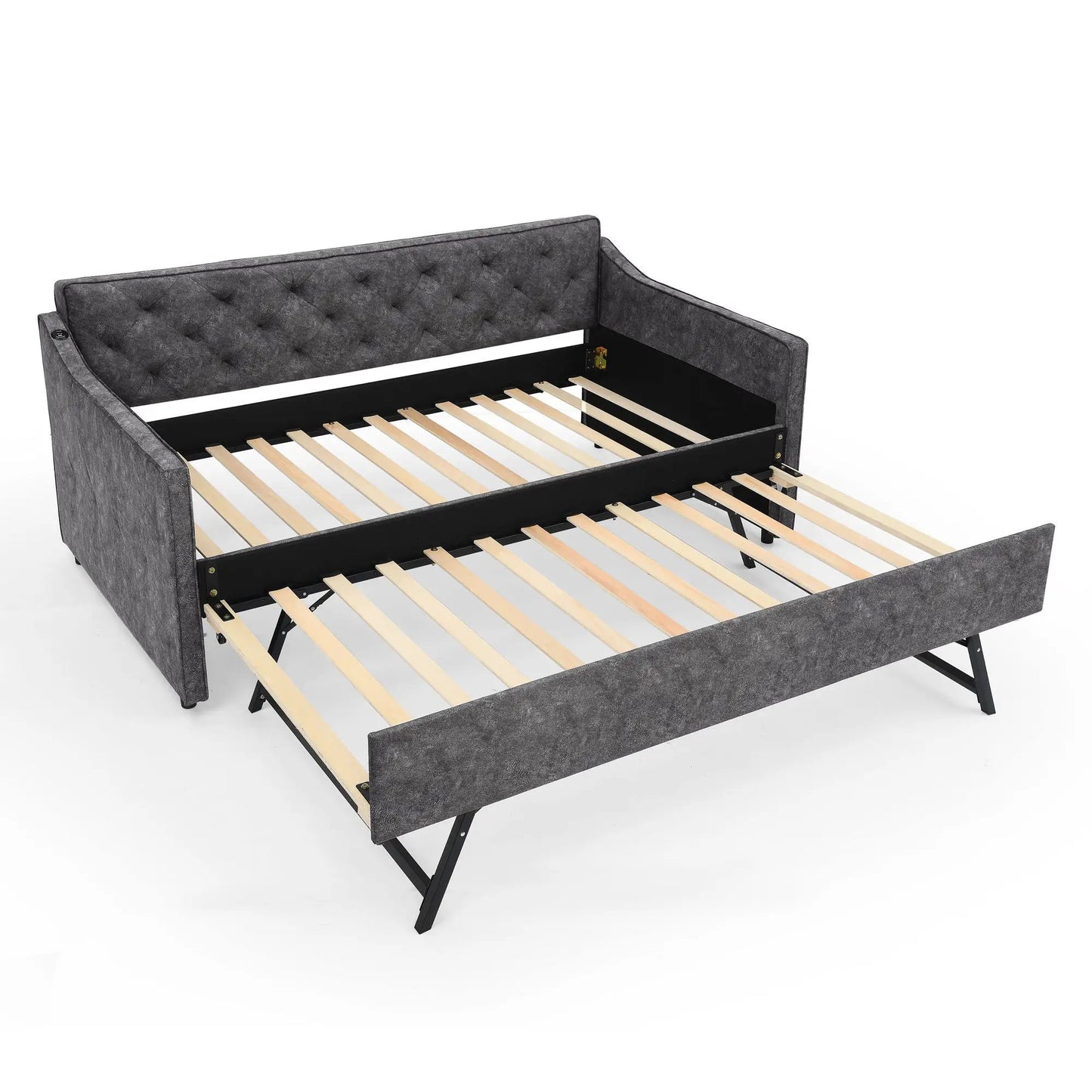 Daybed with pop up trundle and USB charging armrest in dark gray tufted upholstery on Tampa Home & Garden Store