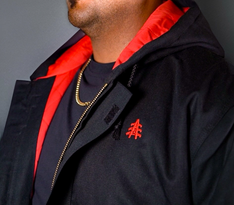 FR Black Insulated CAT3 Jacket by Static FR, hooded bomber with red lining and chest logo on Tampa Home & Garden Store