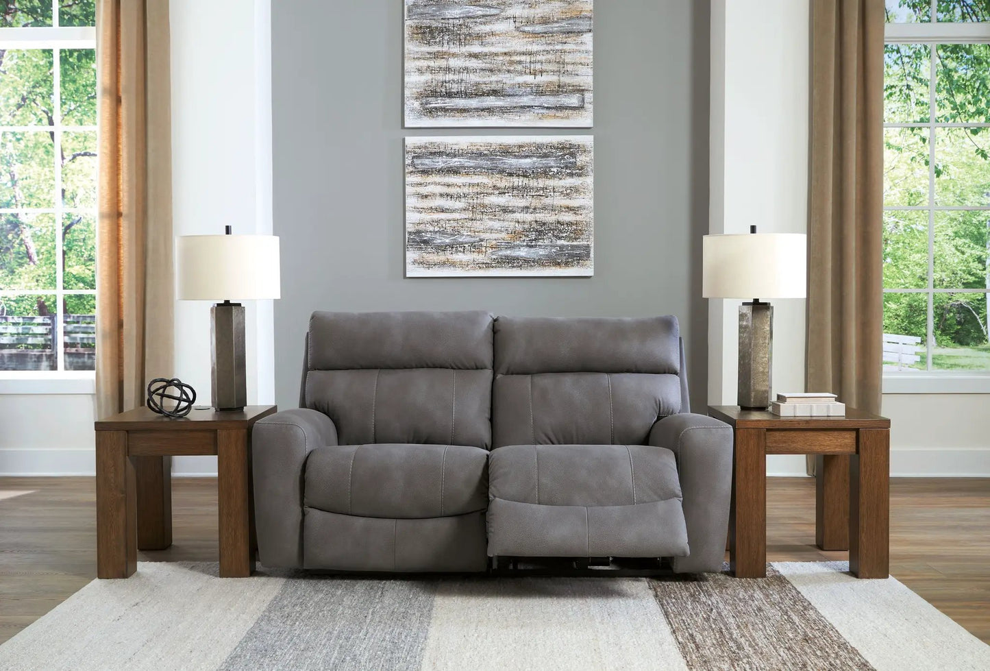 Next-Gen Durapella reclining sectional in gray upholstery with dark wood end tables on Tampa Home & Garden Store