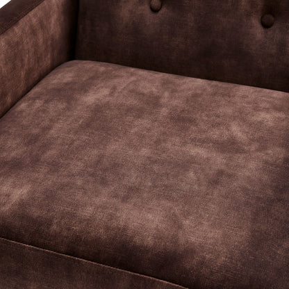 Tufted back arm chair with commercial-grade upholstery in dark brown velvet, close-up on Tampa Home & Garden Store
