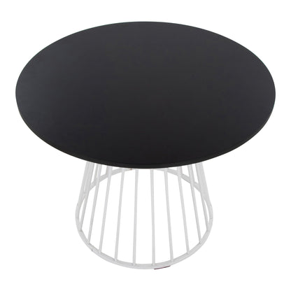Contemporary dining table with black round top and white metal base on Tampa Home & Garden Store