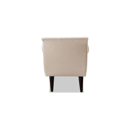 Tufted flared-arm entryway bench in beige upholstery with dark tapered legs on Tampa Home & Garden Store