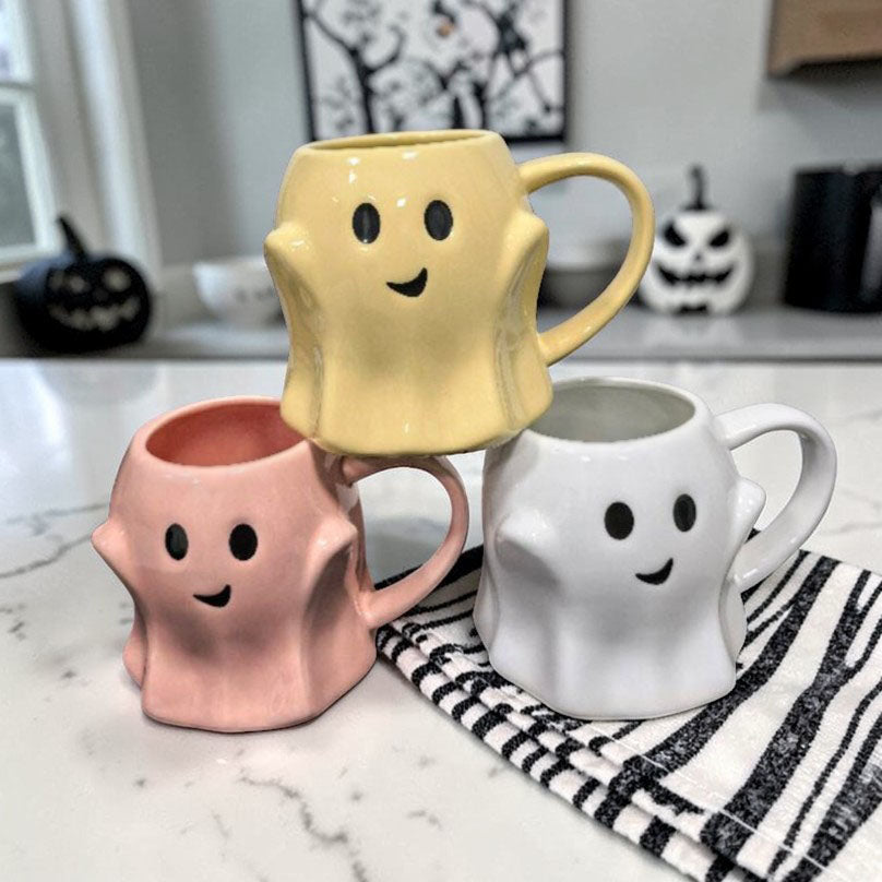 Ghost Mugs trio by Gia Roma; pastel yellow, pink, and white ghost mugs with smiling faces on Tampa Home & Garden Store