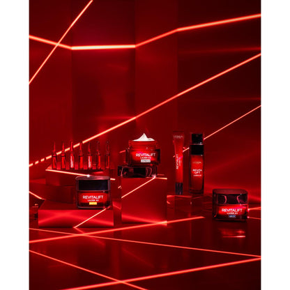 Revitalift Lazer X3 anti-aging day cream on red skincare lineup displayed with neon red lines on Tampa Home & Garden Store