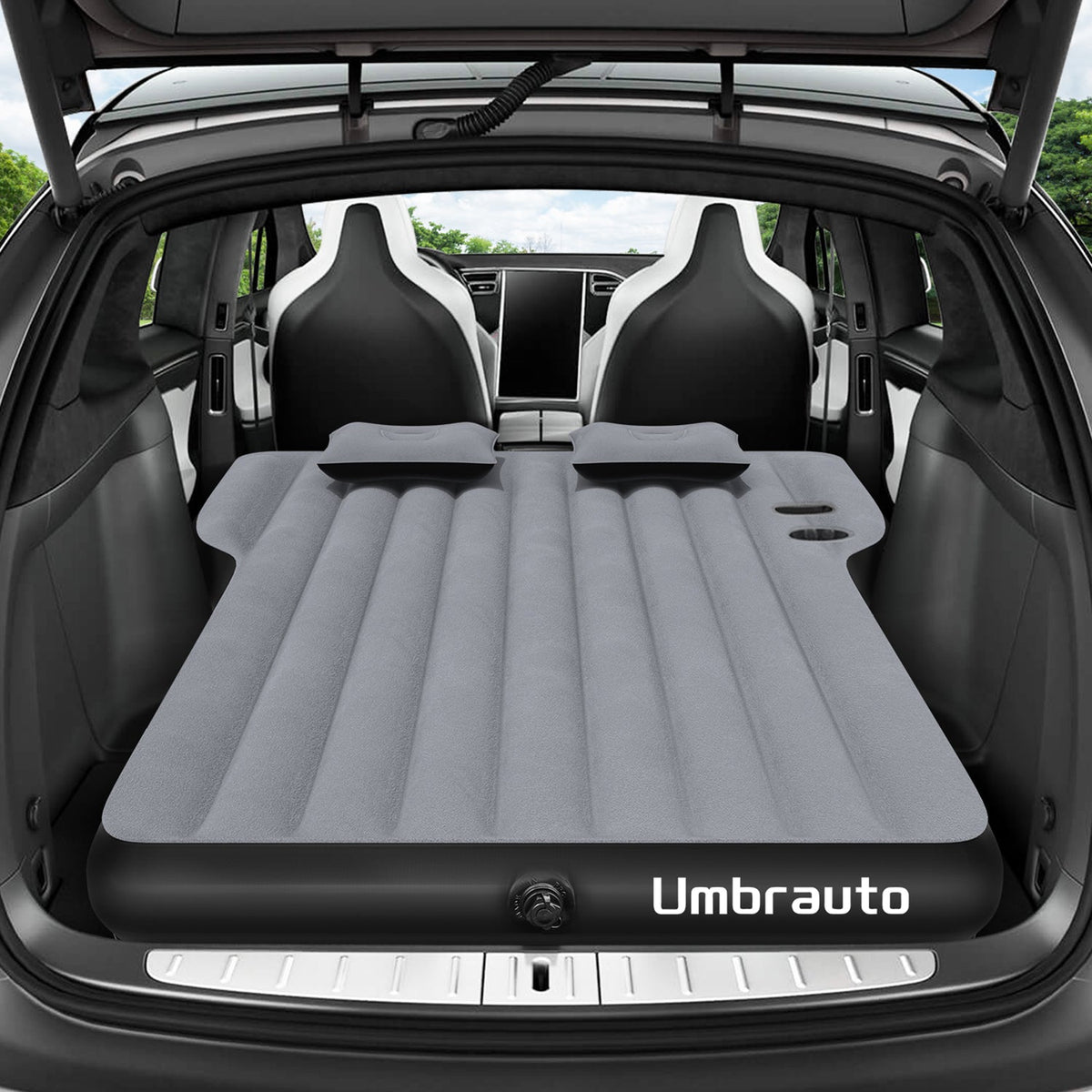 Umbrauto gray SUV air mattress spread in the trunk of a Tesla Y with two head cushions on Tampa Home & Garden Store