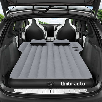 Umbrauto gray SUV air mattress spread in the trunk of a Tesla Y with two head cushions on Tampa Home & Garden Store