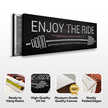 Enjoy The Ride Gym Sign Canvas with black background and distressed white lettering on Tampa Home & Garden Store