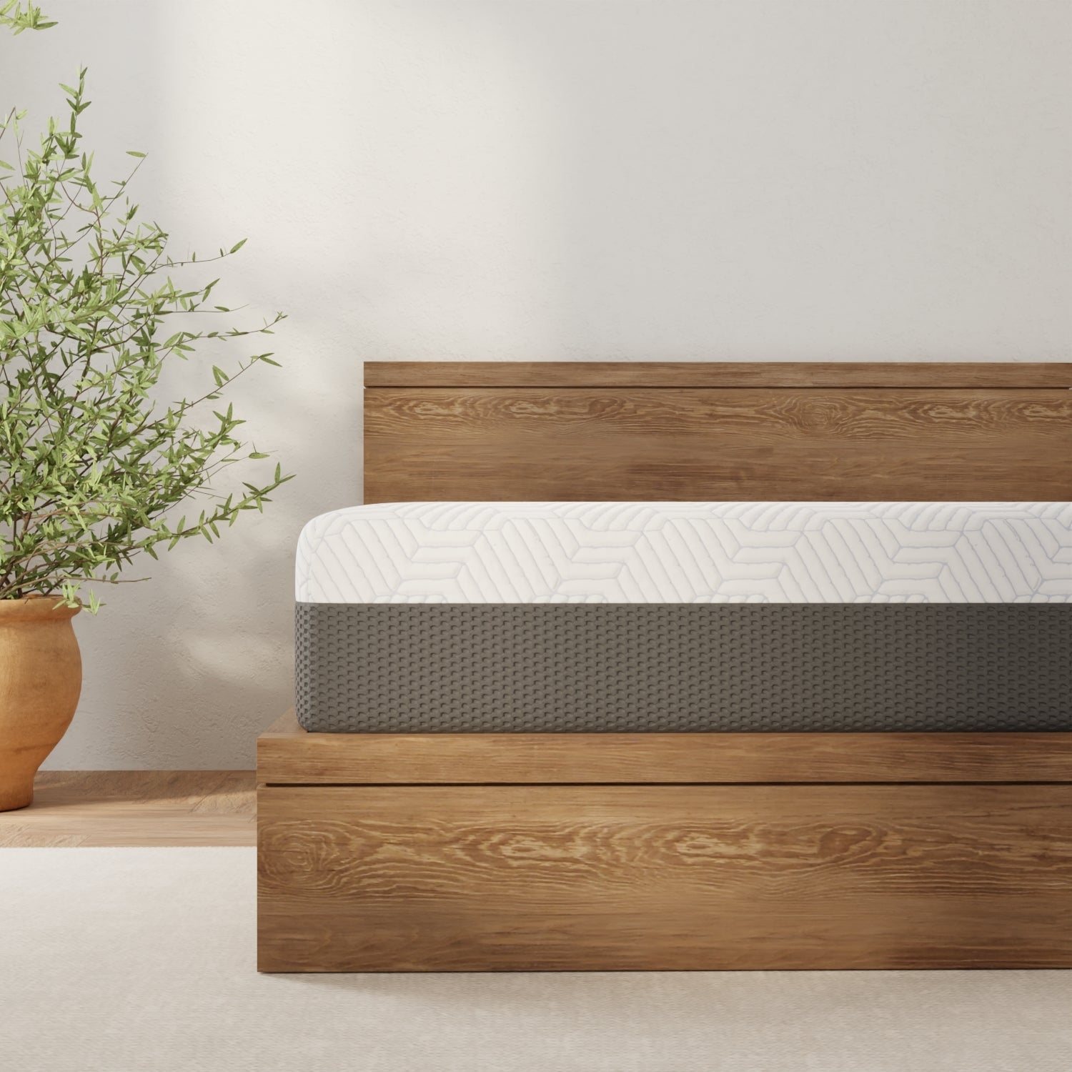 Omne Fria 12 Inch Queen Soft Mattress with cooling cover on a wooden platform bed on Tampa Home & Garden Store