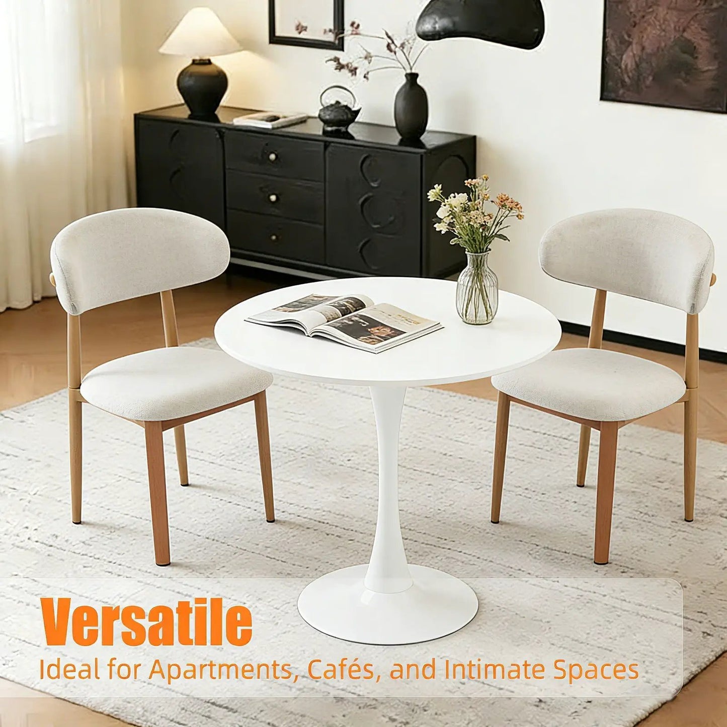 Round dining table with tulip-style white pedestal base by Unique Piece Furniture, beige chairs on Tampa Home & Garden Store