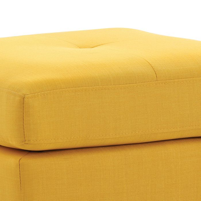 Upholstered ottoman mustard yellow fabric with tufted top and seam detailing on Tampa Home & Garden Store