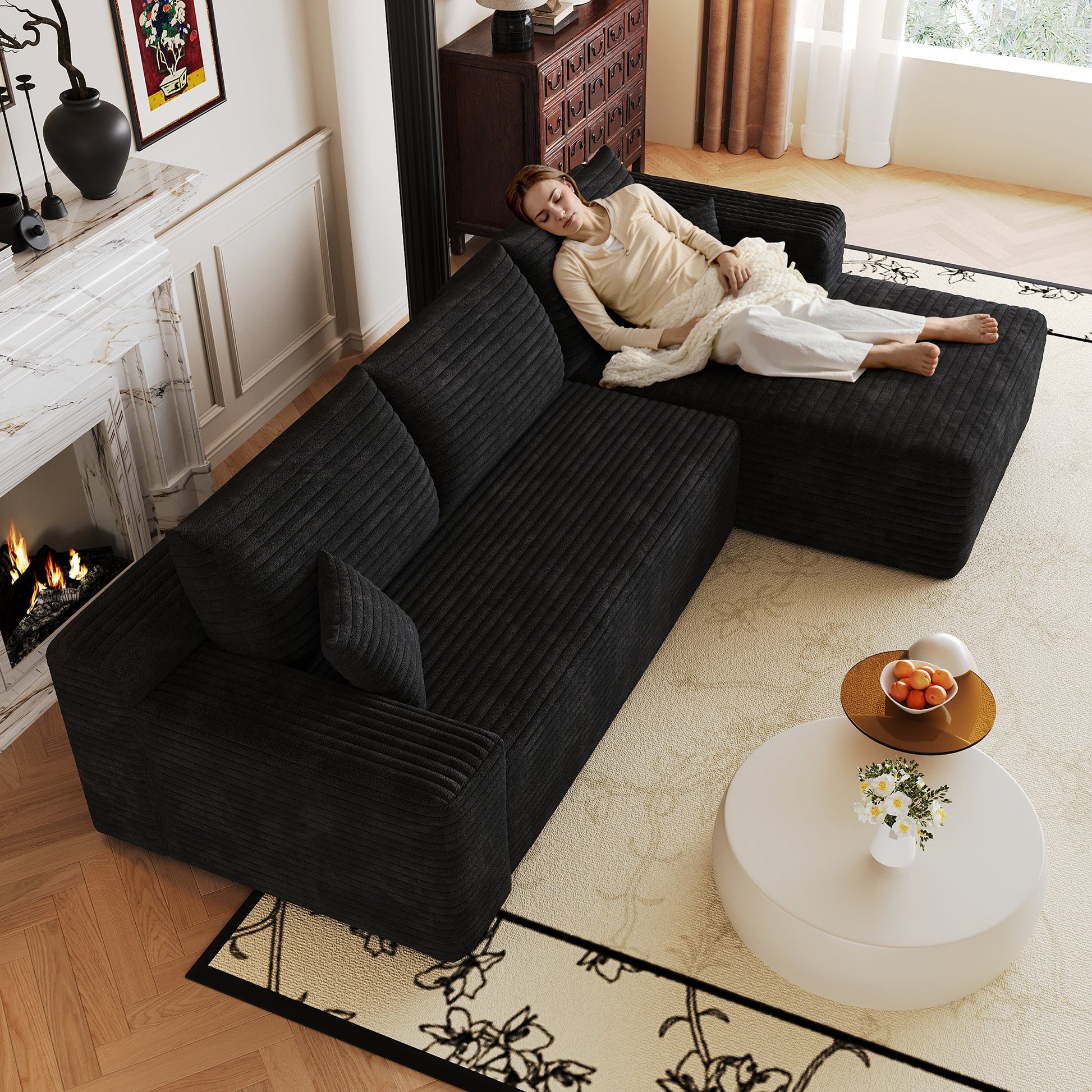 Modern Minimalist Cloud Sectional Sofa in dark charcoal ribbed fabric, cozy living room scene on Tampa Home & Garden Store