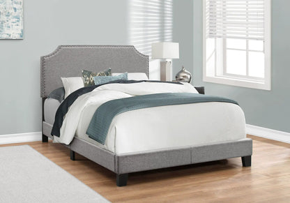 Bed Upholstered Transitional gray headboard with nailhead trim; teal bedding Unique Piece on Tampa Home & Garden Store