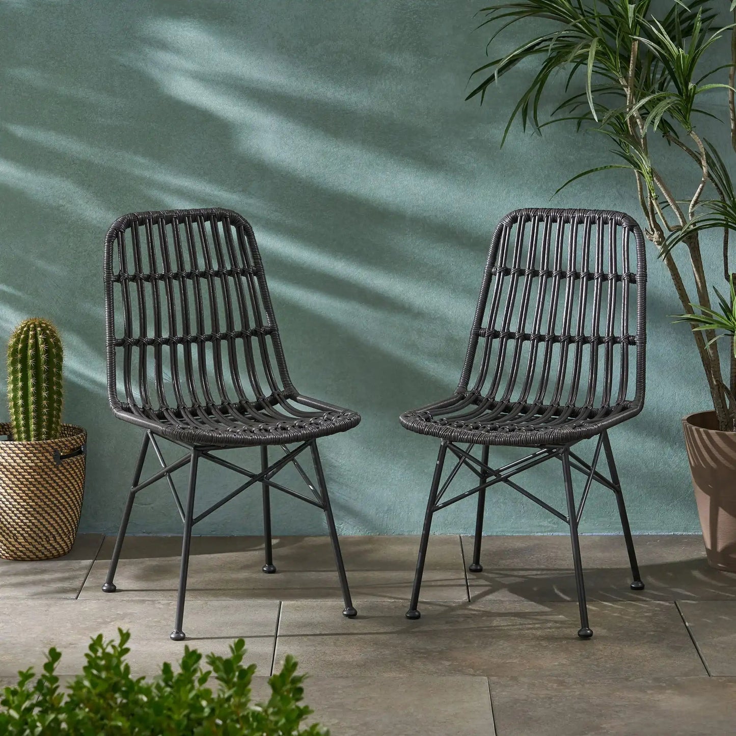 Sawtelle Outdoor Dining Chair pair in black wicker with metal legs by HouseOfZazla on Tampa Home & Garden Store