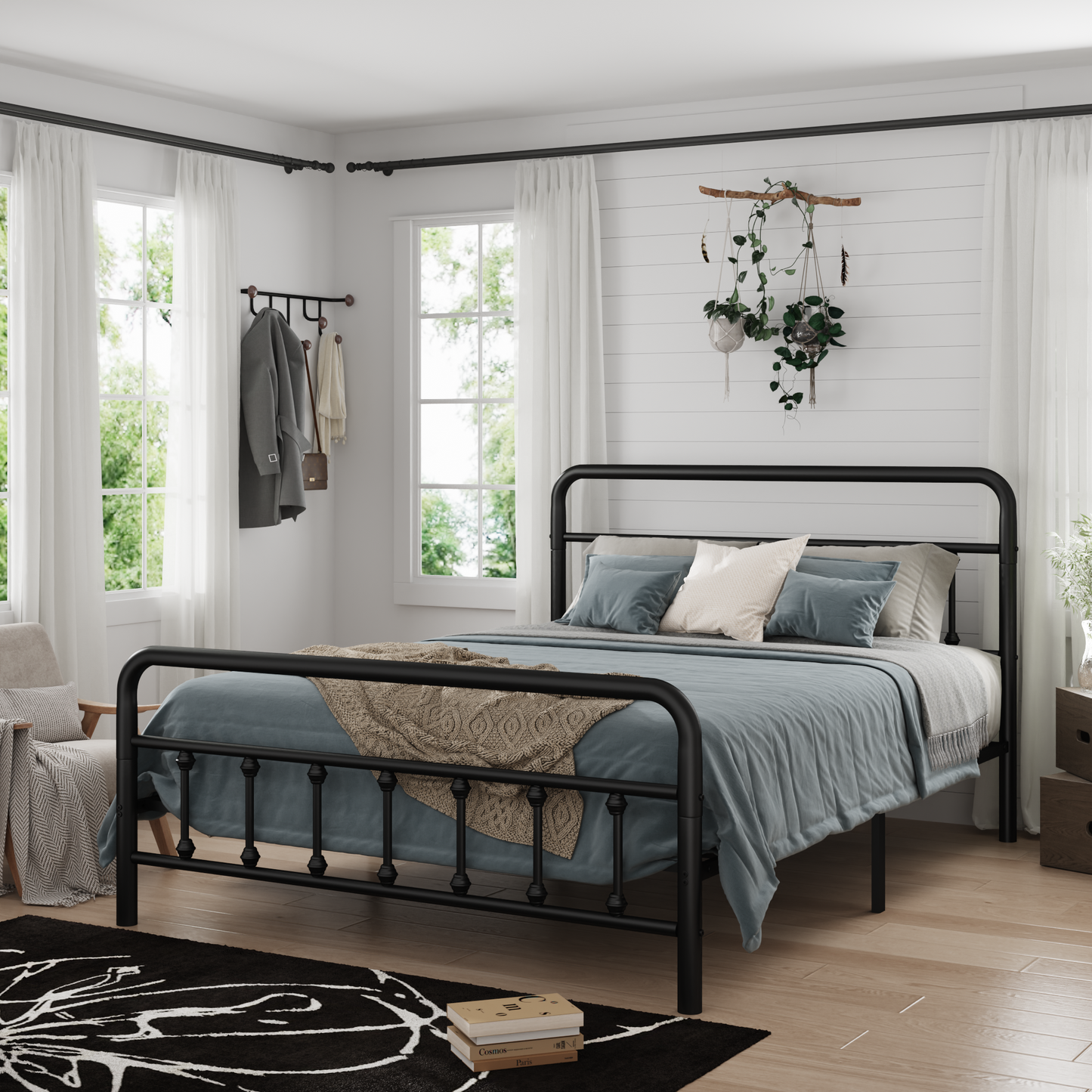 Pair of black metal full-size bed frames with headboards in a bright bedroom with blue-gray bedding on Tampa Home & Garden Store