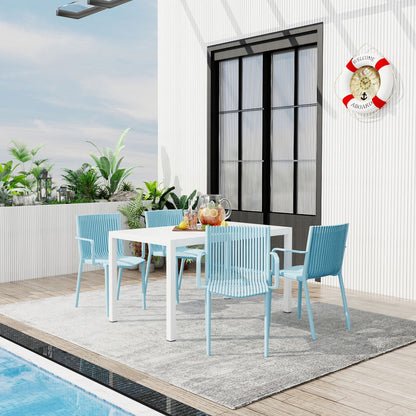 4 Modern Stackable Armchairs and Long Table