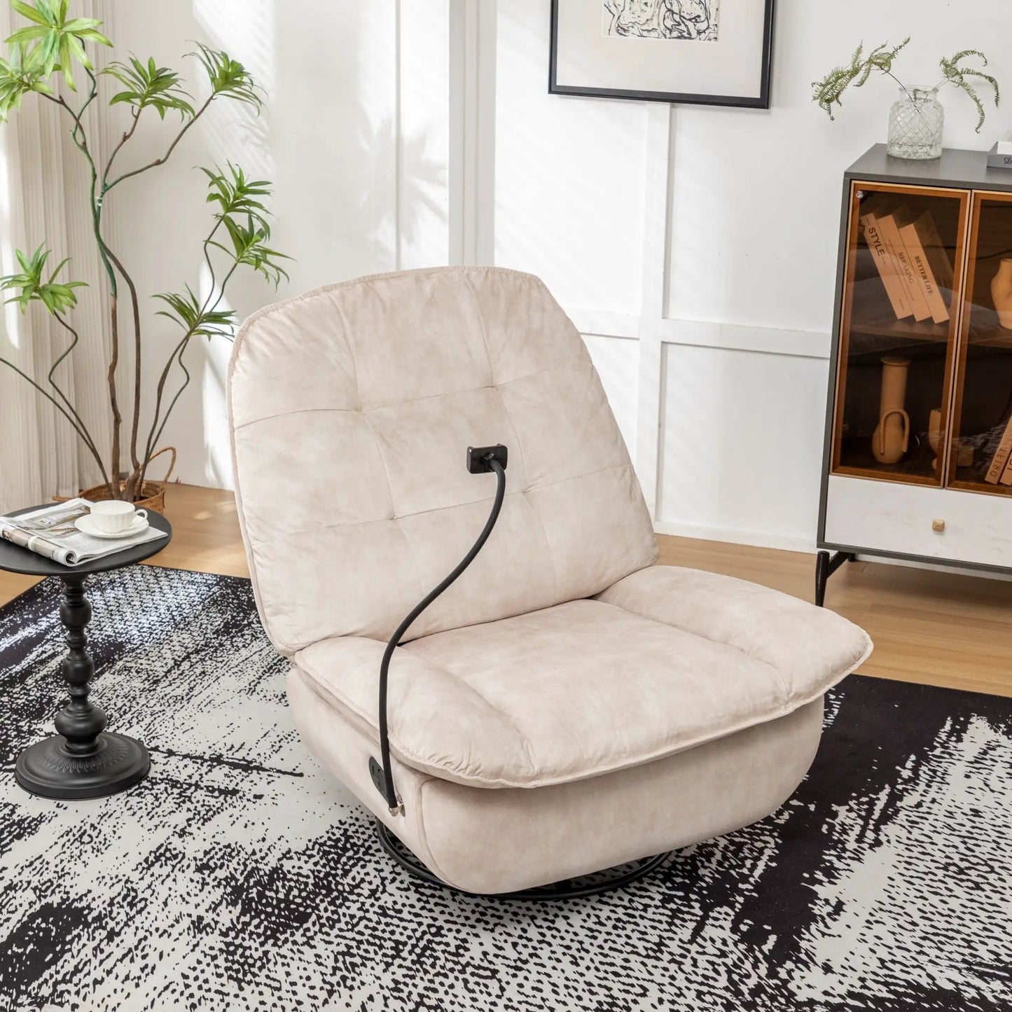 Beige swivel glider chair with plush cushions in a bright living room on Tampa Home & Garden Store