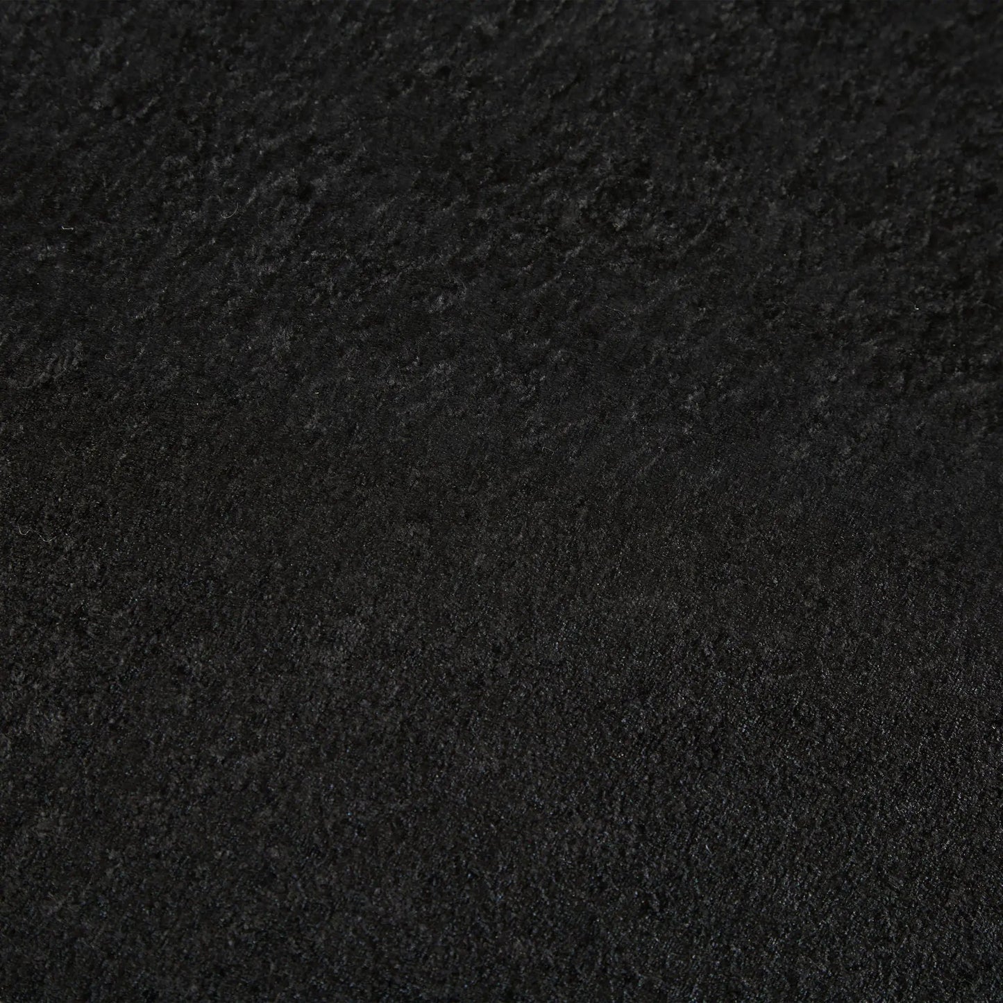Sleeper loveseat fabric texture in black velvet close-up on Tampa Home & Garden Store