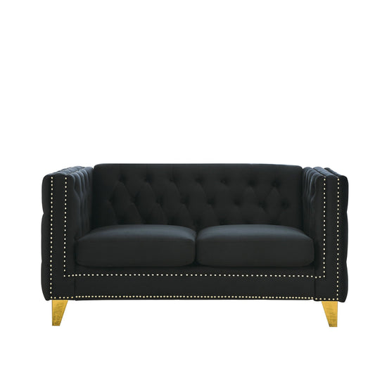 Modern black button-tufted stationary sofa with nailhead trim and gold legs on Tampa Home & Garden Store