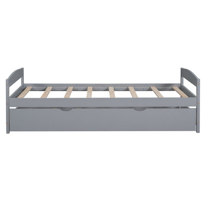 Platform bed with trundle in gray finish, curved headboard rails, and natural wood slats on Tampa Home & Garden Store