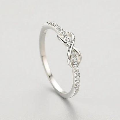 Silver ring with twisted knot and pave diamond band on Tampa Home & Garden Store