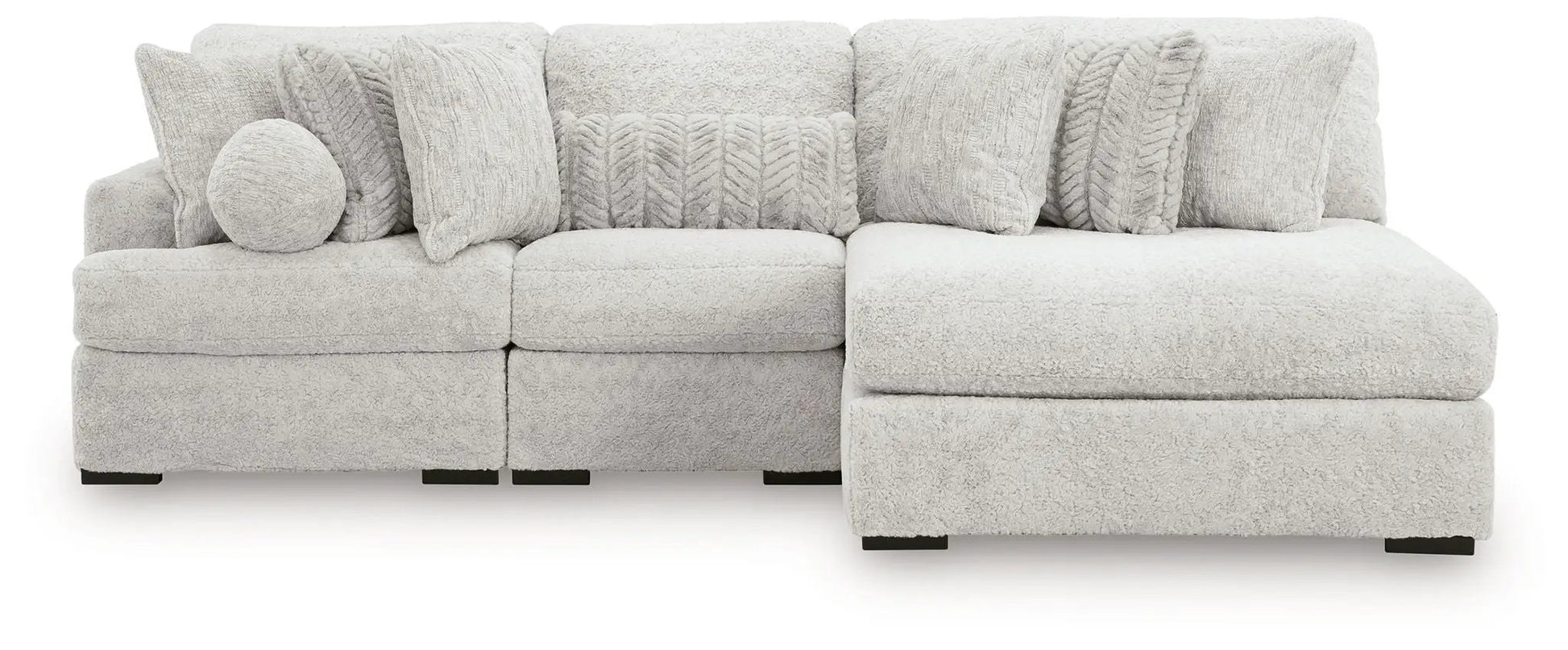 Cuddle Plush stationary sectional sofa in light gray boucle with right chaise and pillows on Tampa Home & Garden Store