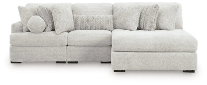 Cuddle Plush stationary sectional sofa in light gray boucle with right chaise and pillows on Tampa Home & Garden Store