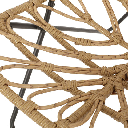 Bryson light brown outdoor chair with woven rattan and black metal cross base on Tampa Home & Garden Store