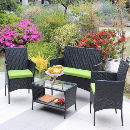 4pc rattan furniture set with cushioned wicker seating and green cushions HouseOfZazla on Tampa Home & Garden Store