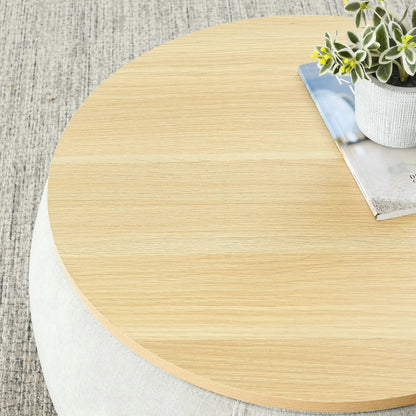 Round light oak end table with a white textured planter and a magazine on Tampa Home & Garden Store