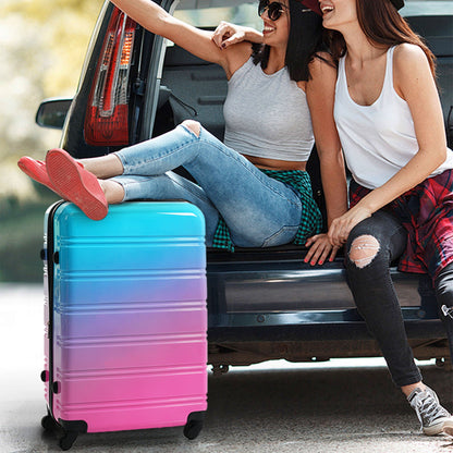 Hardshell gradient luggage with turquoise pink finish and spinner wheels on Tampa Home & Garden Store