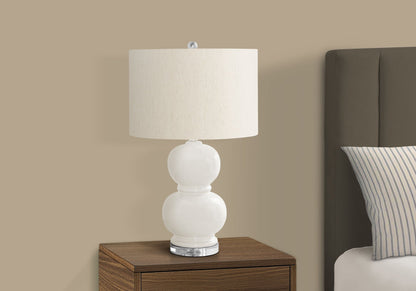 Contemporary ceramic table lamp by HouseOfZazla in cream with white stacked globe base on Tampa Home & Garden Store