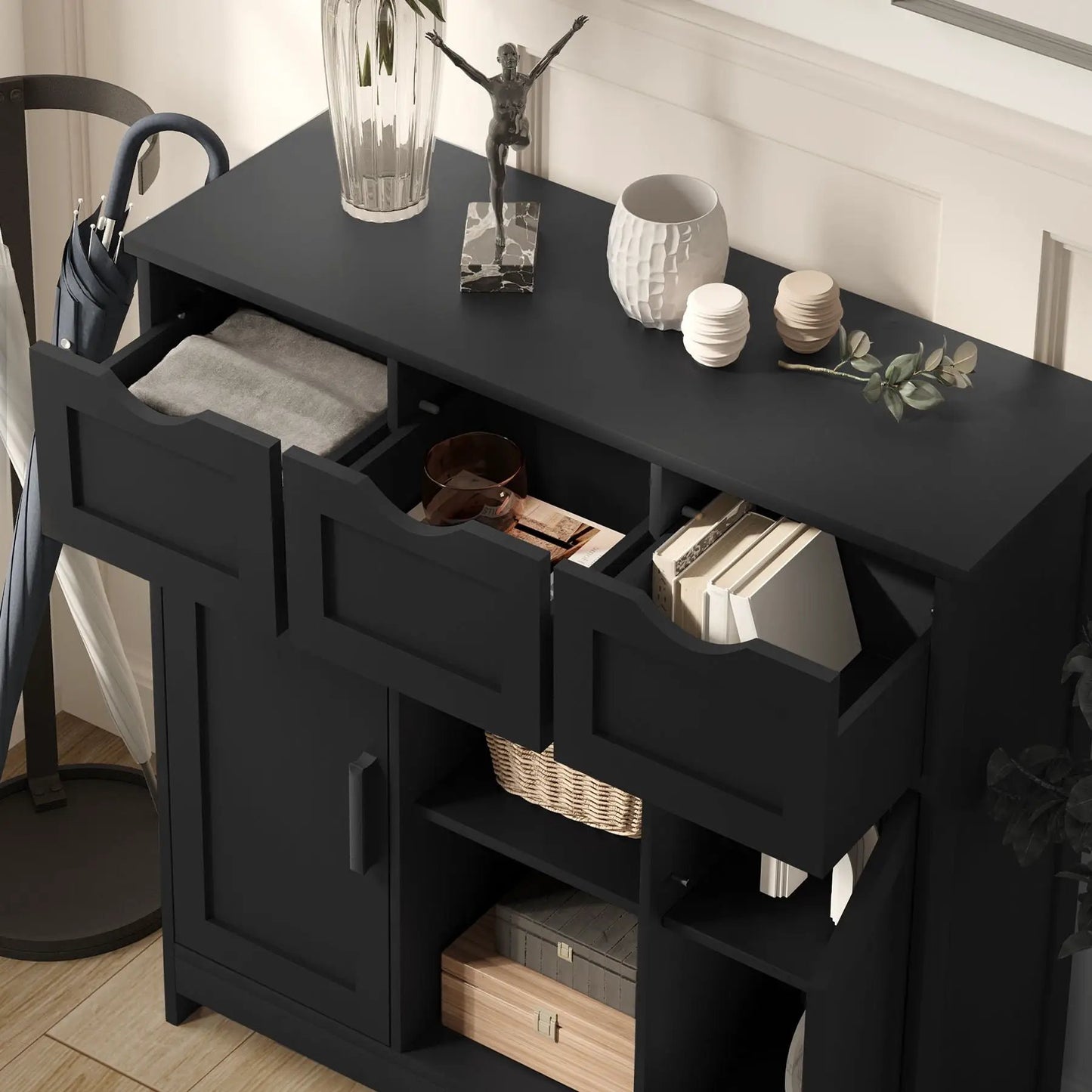Storage cabinet with drawers and open shelves in dark finish by Unique Piece Furniture, with vase and sculpture on Tampa Home & Garden Store
