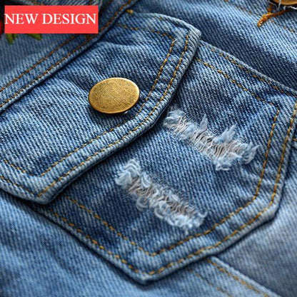 Baby girls blue denim jacket with distressed ripped patches and brass button on Tampa Home & Garden Store