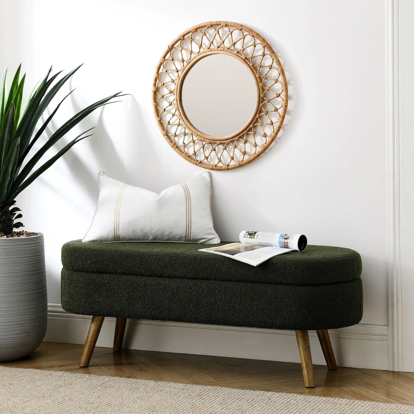 Ottoman oval storage bench in dark green upholstery with rubber wood legs on Tampa Home & Garden Store
