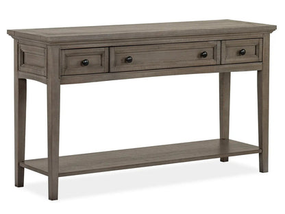 Paxton Place Rectangular Sofa Table in dovetail gray with three drawers and lower shelf on Tampa Home & Garden Store
