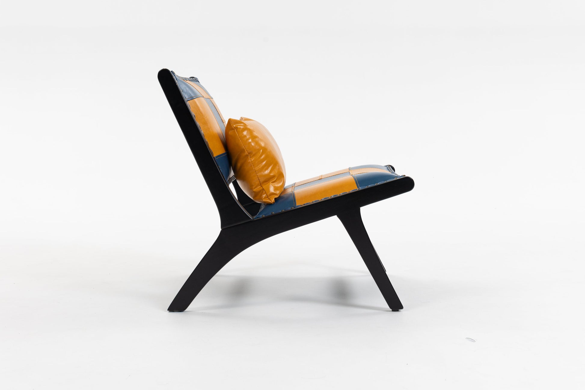 Modern Boho accent chair with blue and orange leather patchwork, living room armchair on Tampa Home & Garden Store