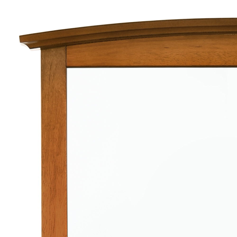 Elegant wall mirror with warm wood veneer frame and crown molding detail on Tampa Home & Garden Store