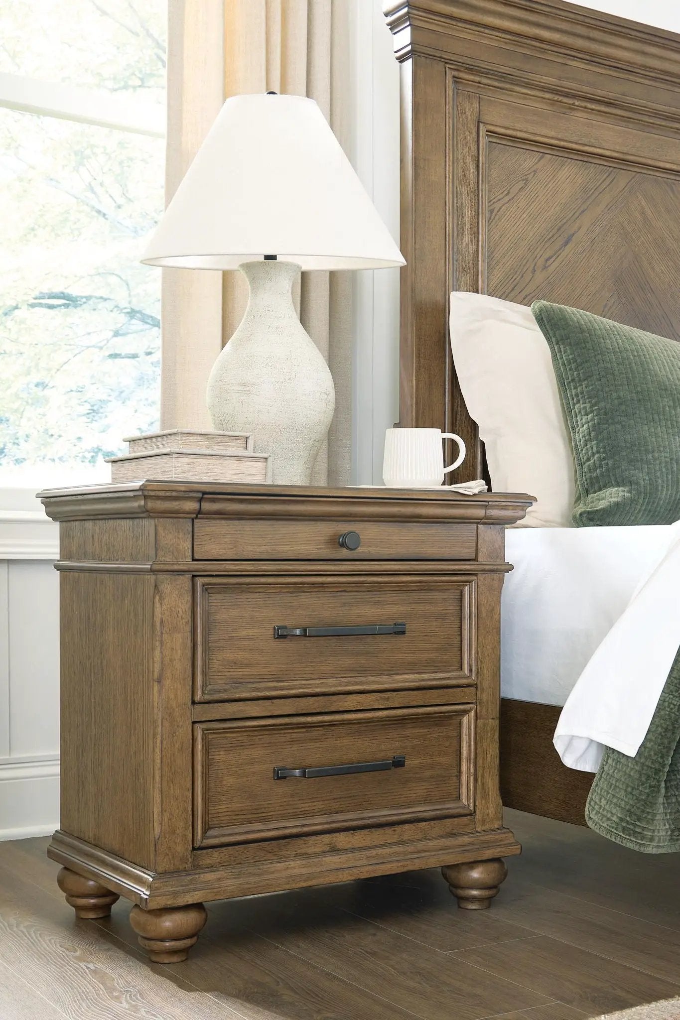 Karallin Three Drawer Night Stand by Unique Piece Furniture in medium brown wood with bun feet on Tampa Home & Garden Store