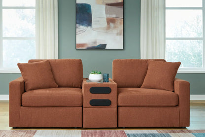 Modmax Sectional Spice in burnt orange fabric with center console and cup holders on Tampa Home & Garden Store