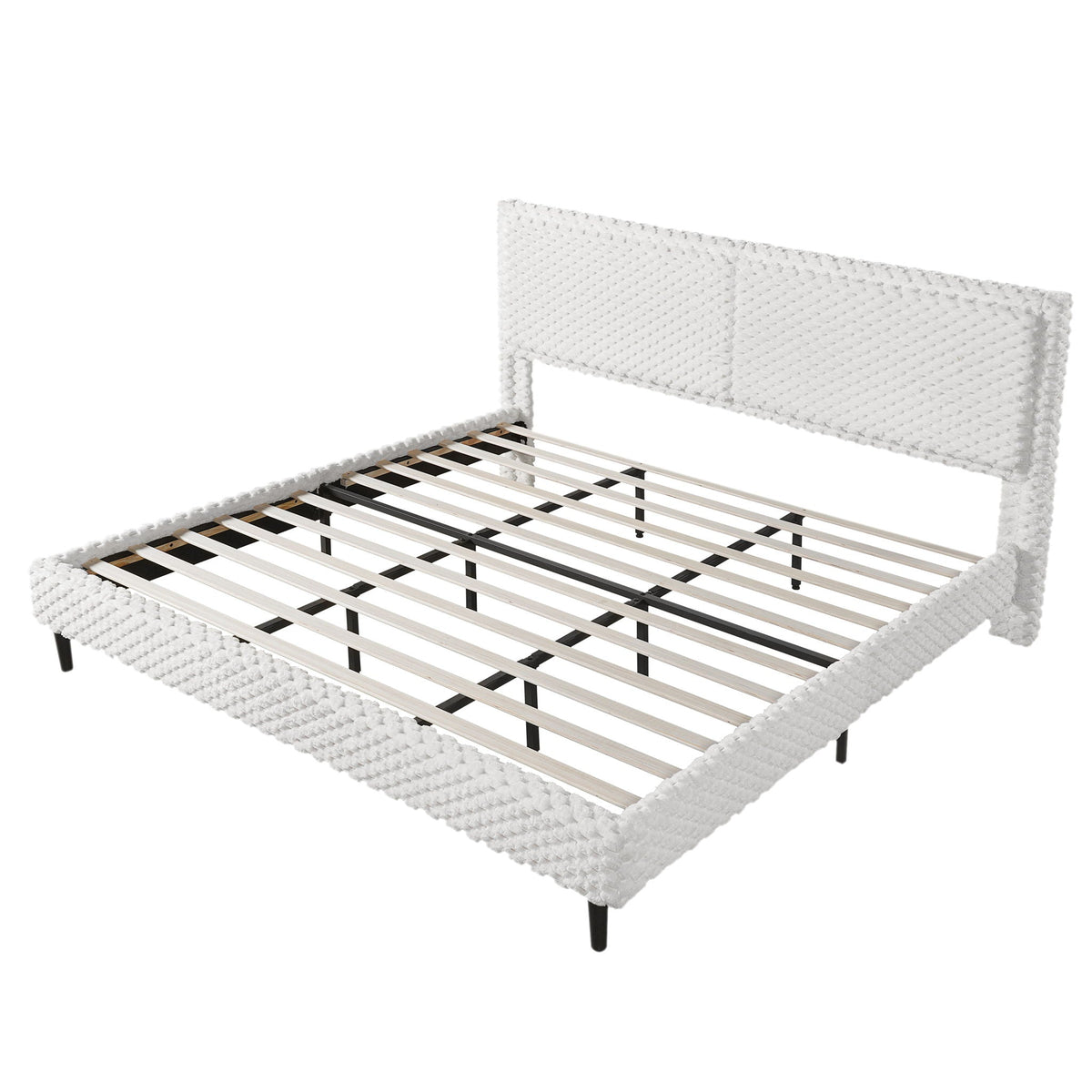 White upholstered bed with chunky knit backrest panels and slatted base on a black frame on Tampa Home & Garden Store
