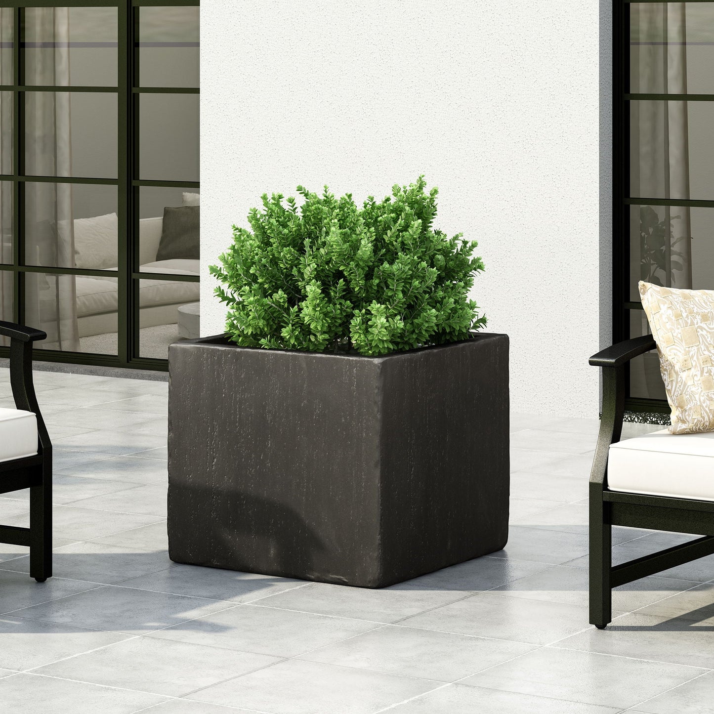 Modern Outdoor Planter by HouseOfZazla, black rectangular stone-look planter with green shrub on Tampa Home & Garden Store