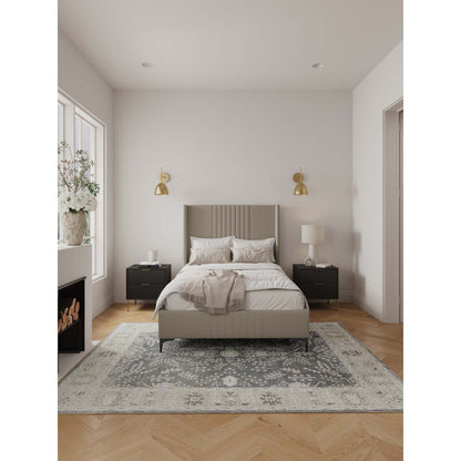 Promenade bed with gray upholstered headboard and slats, neutral bedding, black nightstands, on Tampa Home & Garden Store