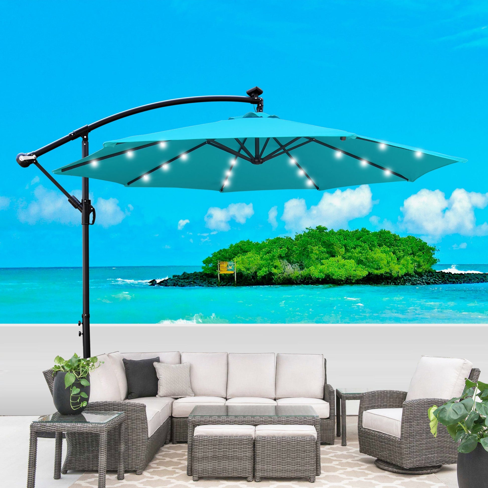 10 ft outdoor patio umbrella with solar powered LED lights, teal canopy, curved black arm on Tampa Home & Garden Store