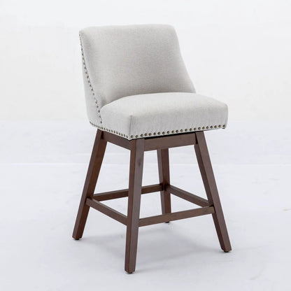 Counter height swivel barstools in beige fabric with nailhead trim and wooden legs on Tampa Home & Garden Store