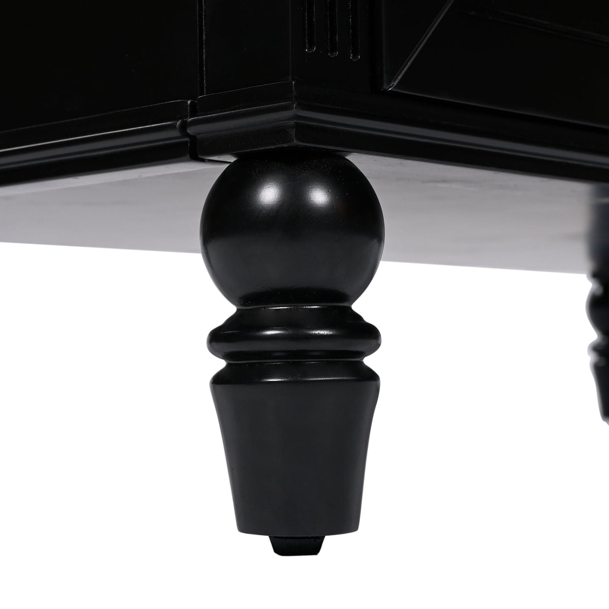Black turned wood vanity leg from freestanding cabinet on Tampa Home & Garden Store