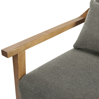Arm accent chair with lumbar pillow in dark gray fabric and natural wood arms on Tampa Home & Garden Store