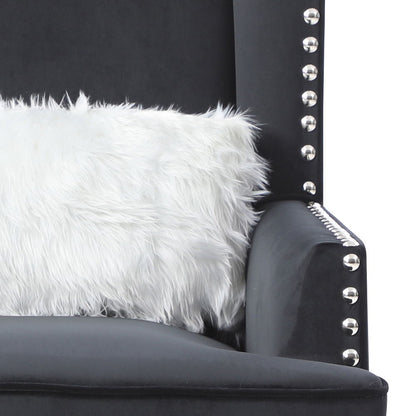 Traditional accent armchair with deep tufting in dark gray fabric, silver nailhead trim on Tampa Home & Garden Store