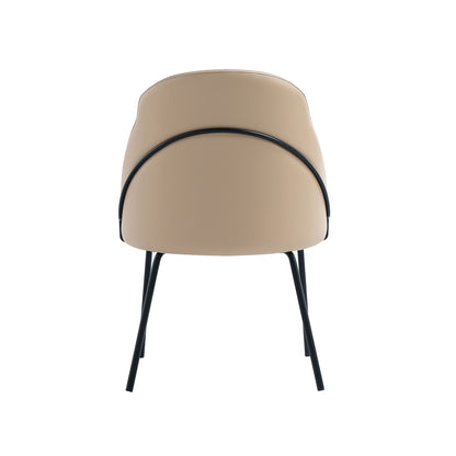Beige vegan upholstered dining chair with curved back and black metal legs on Tampa Home & Garden Store