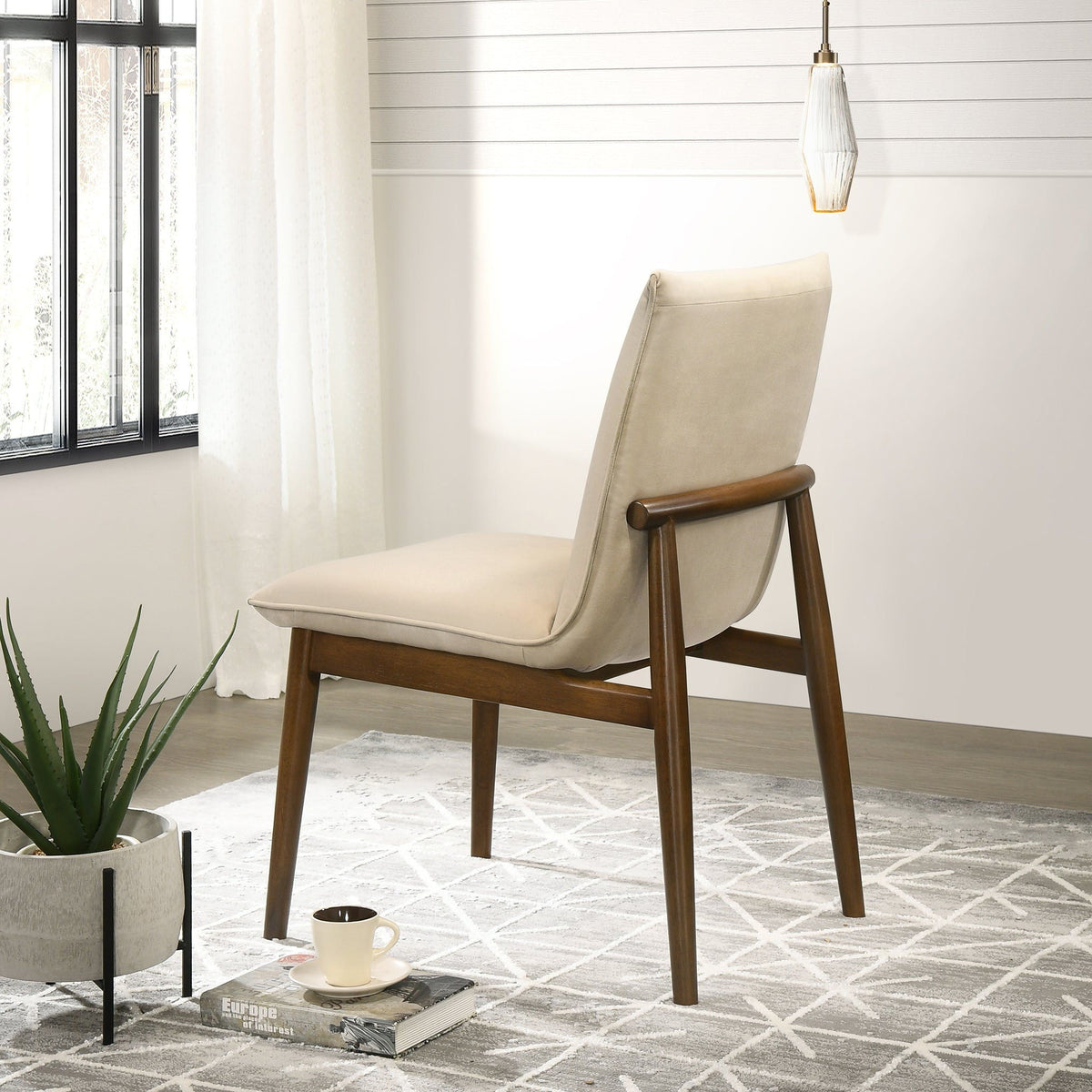 Monza contemporary dining chair with solid wood frame in beige upholstery on Tampa Home & Garden Store