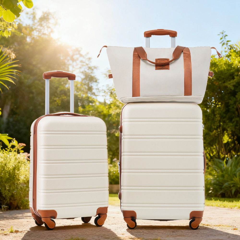 2-piece ivory hardshell luggage set with tan trim and a beige tote on top 20in & 24in on Tampa Home & Garden Store